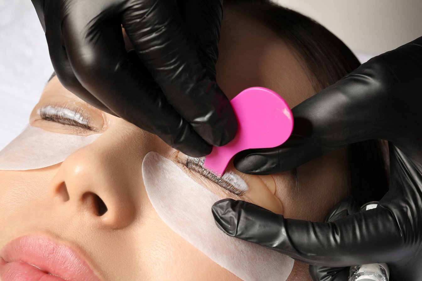 Young Woman Undergoing Eyelash Lamination, Closeup. Professional